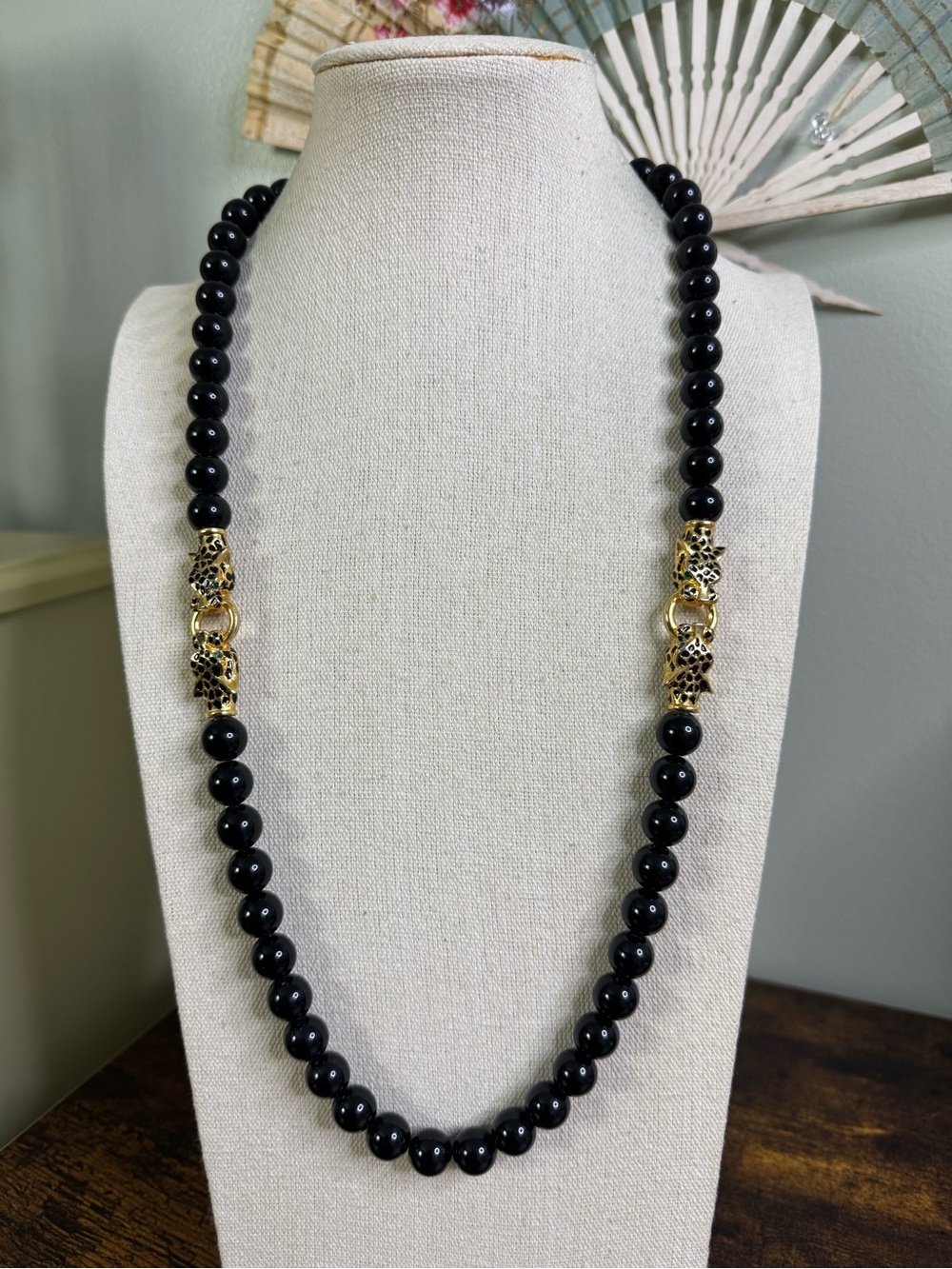 Vintage Black Lucite Bead Necklace with Gold Leopard Accent Links - Green Eyes